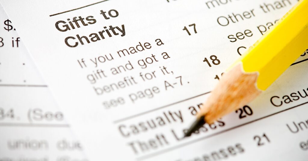 Yellow pencil pointing at "Gifts to Charity
