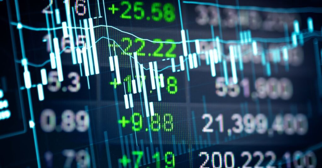 Digital stock market data with fluctuating green numbers and charts.