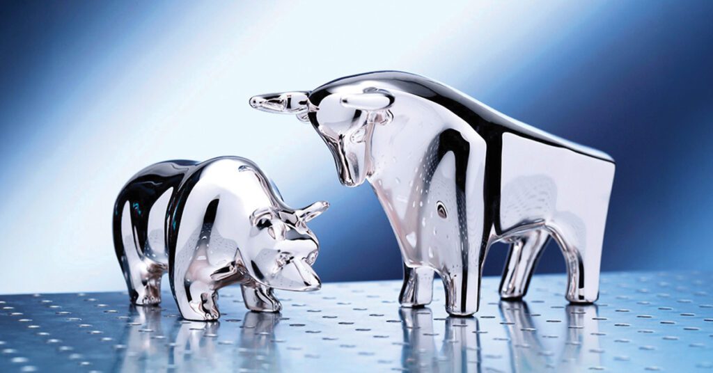 Chrome bull and bear stock market figurines